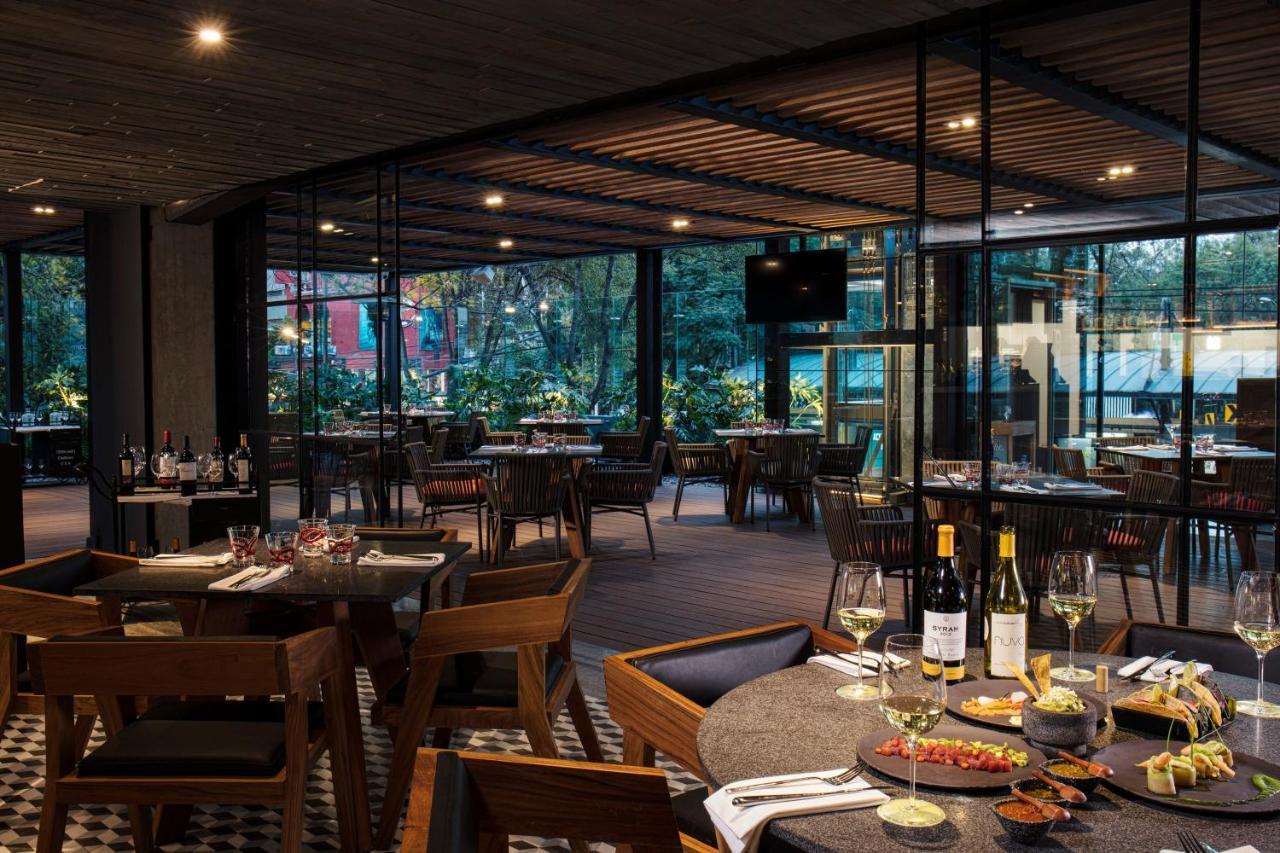 Krystal Grand Suites Insurgentes Mexico By Eksteriør billede The interior of the restaurant