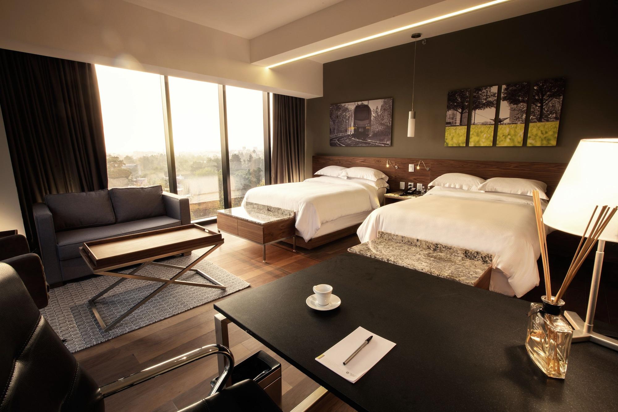 Krystal Grand Suites Insurgentes Mexico By Eksteriør billede A room at the hotel